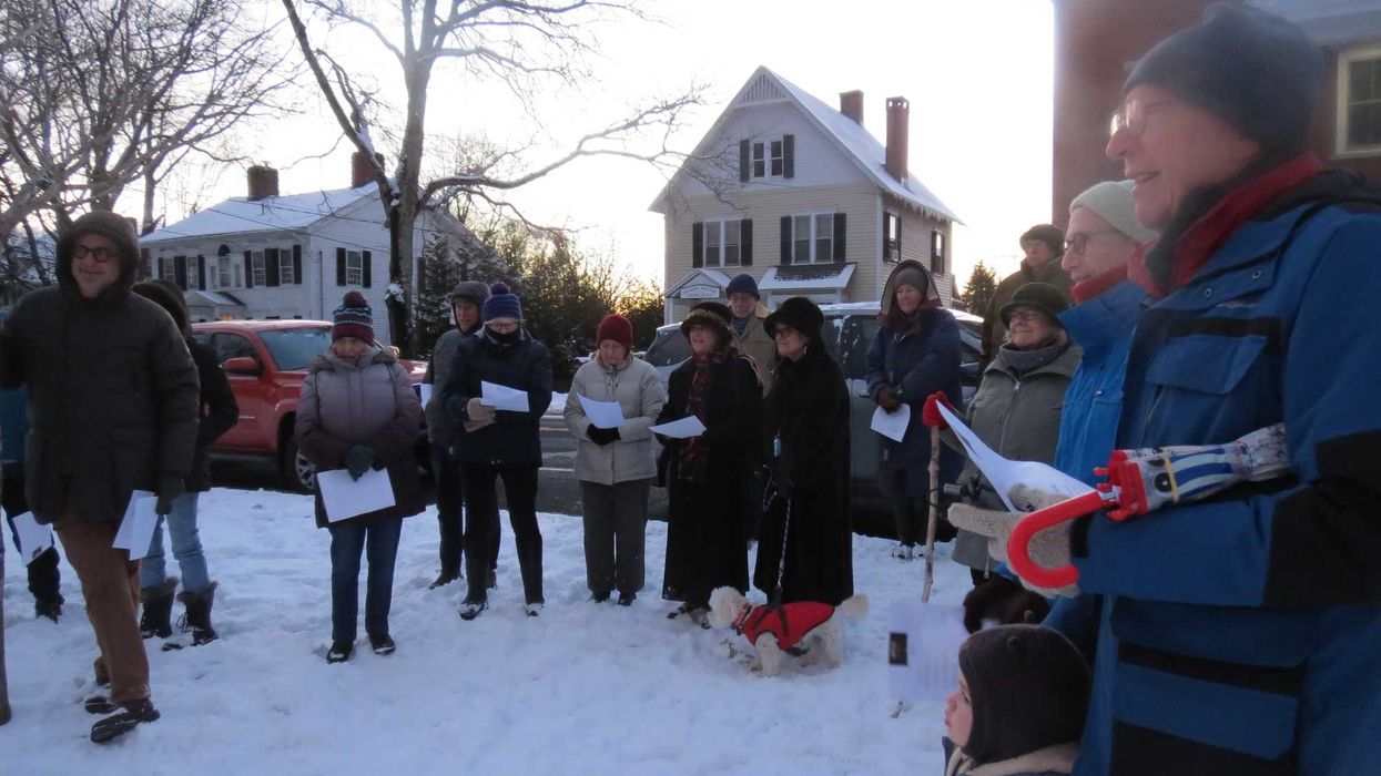 Sharon gathers
to light menorah