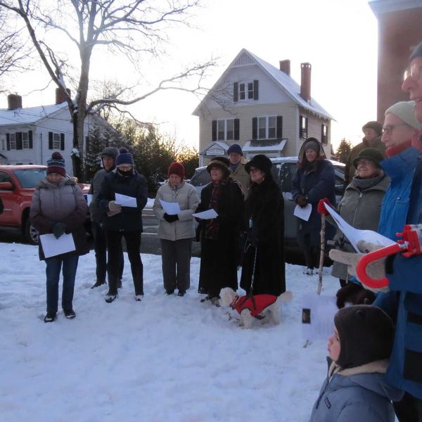 Sharon gathers
to light menorah