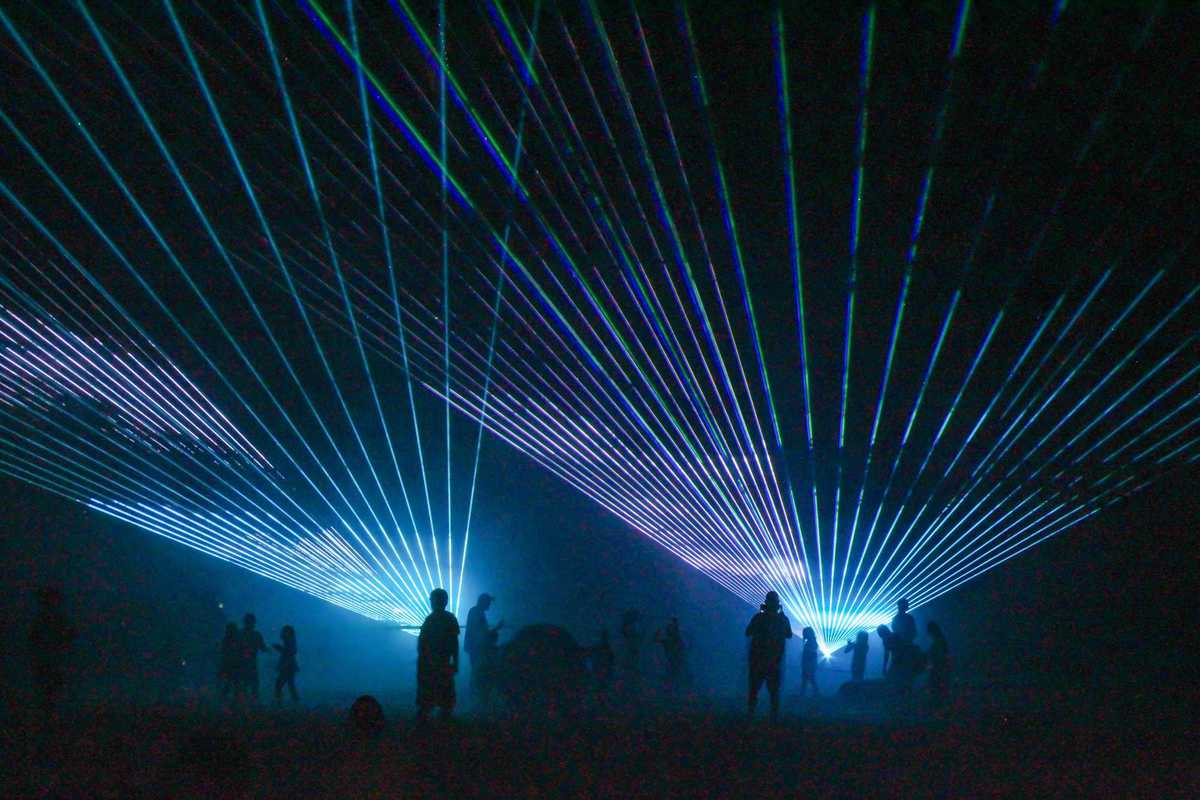 Rescheduled laser show lights up sky at Satre Hill