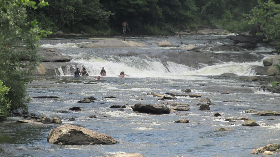 Despite dangers and signs, crowds at the falls