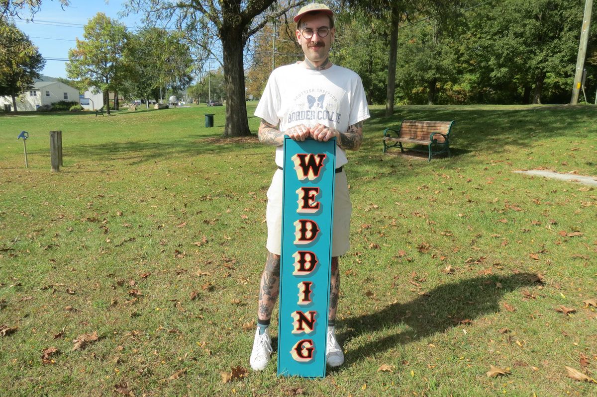 Area signmaker revives brush-and-board branding