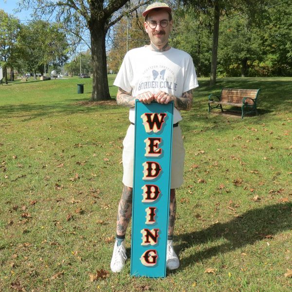 Area signmaker revives brush-and-board branding