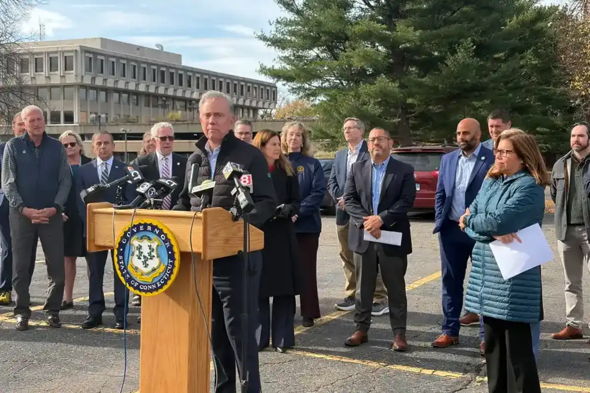 Lamont signs controversial housing bill into law