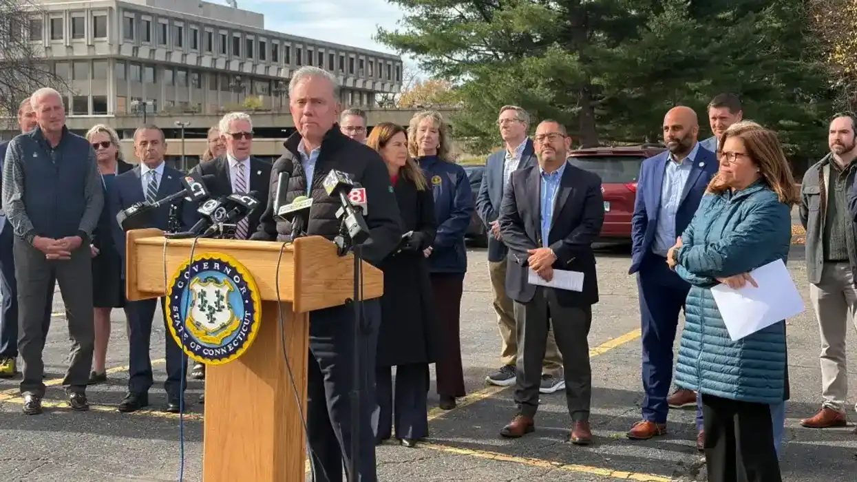 Lamont signs controversial housing bill into law