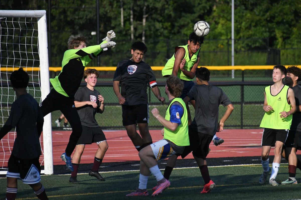 Gustavo Portillo heads the soccer ball