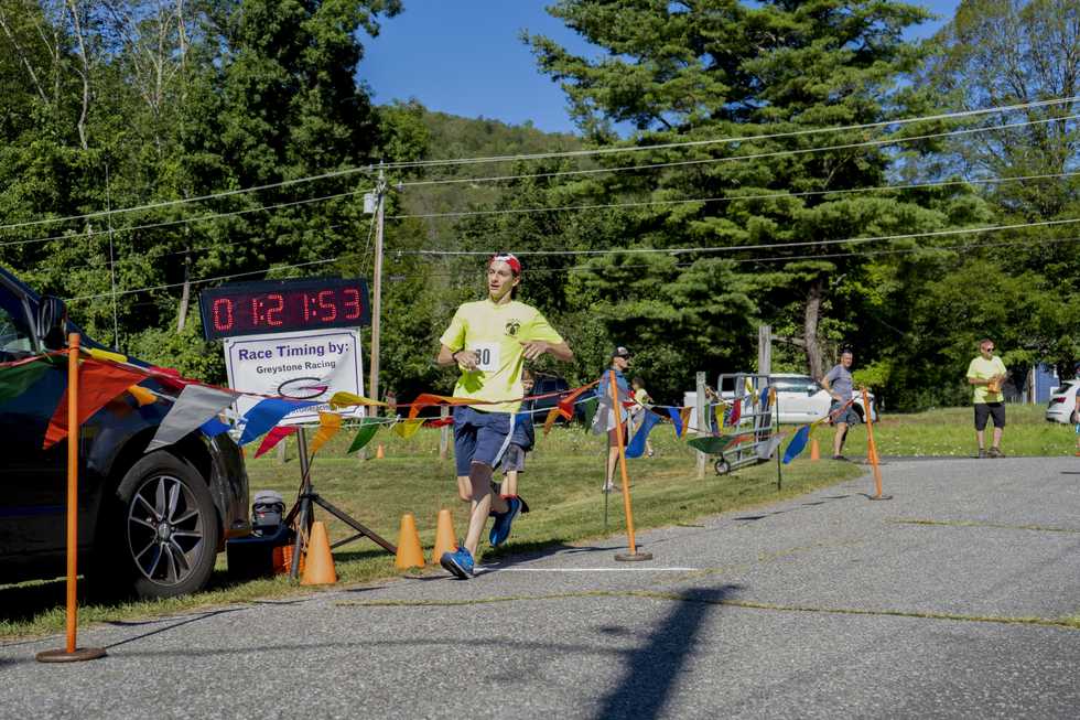 Annual triathlon brings crowd, athletes together at Mudge Pond