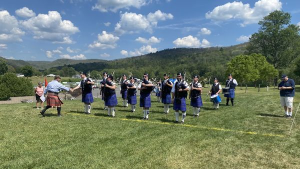 The Keening of the Pipes, the Tapping Of the Drums and of Course the Haggis Toss