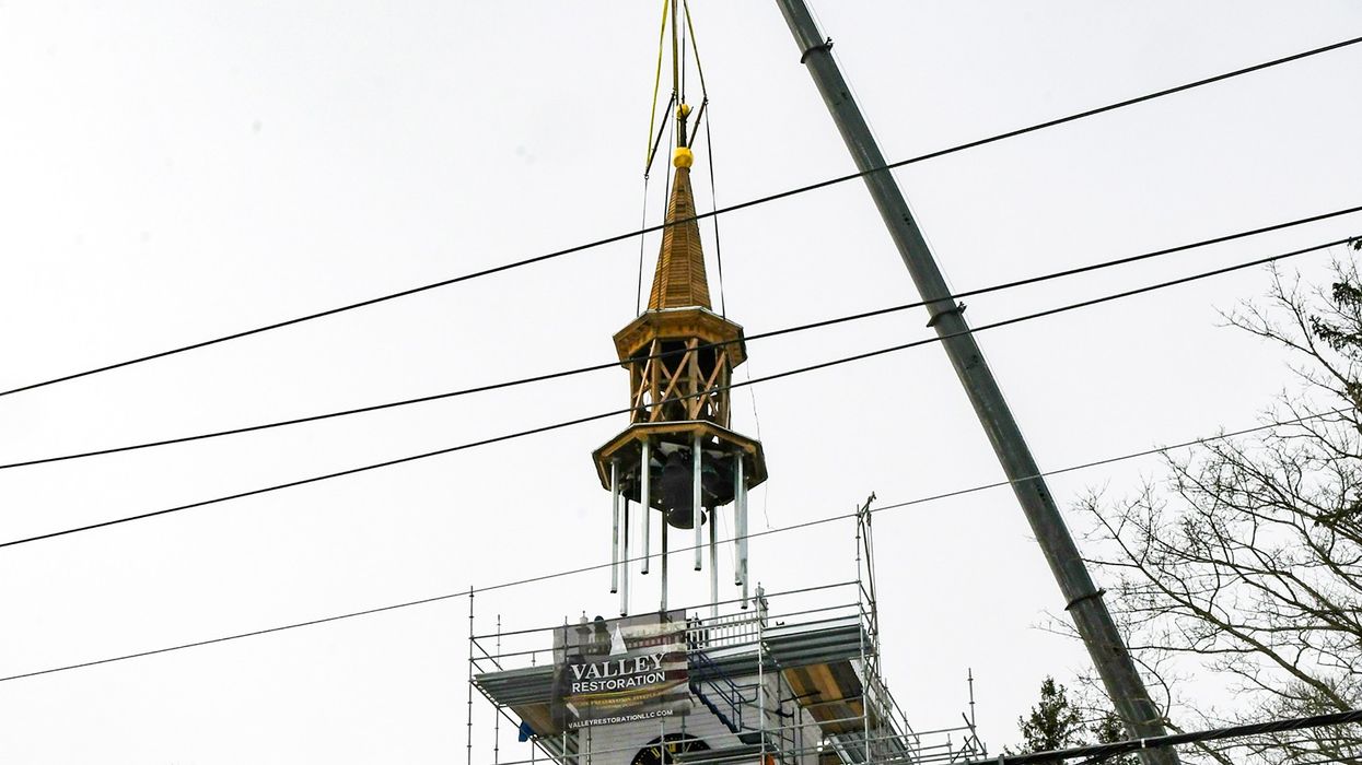 Norfolk church steeple lifted back in place