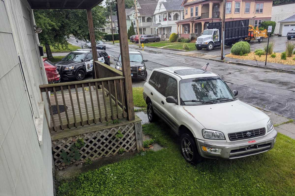 Car chase ends in front yard