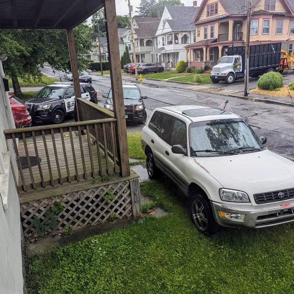 Car chase ends in front yard