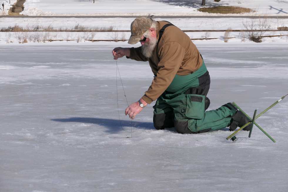 Cold air and sunny skies: The perfect bait for ice fishermen