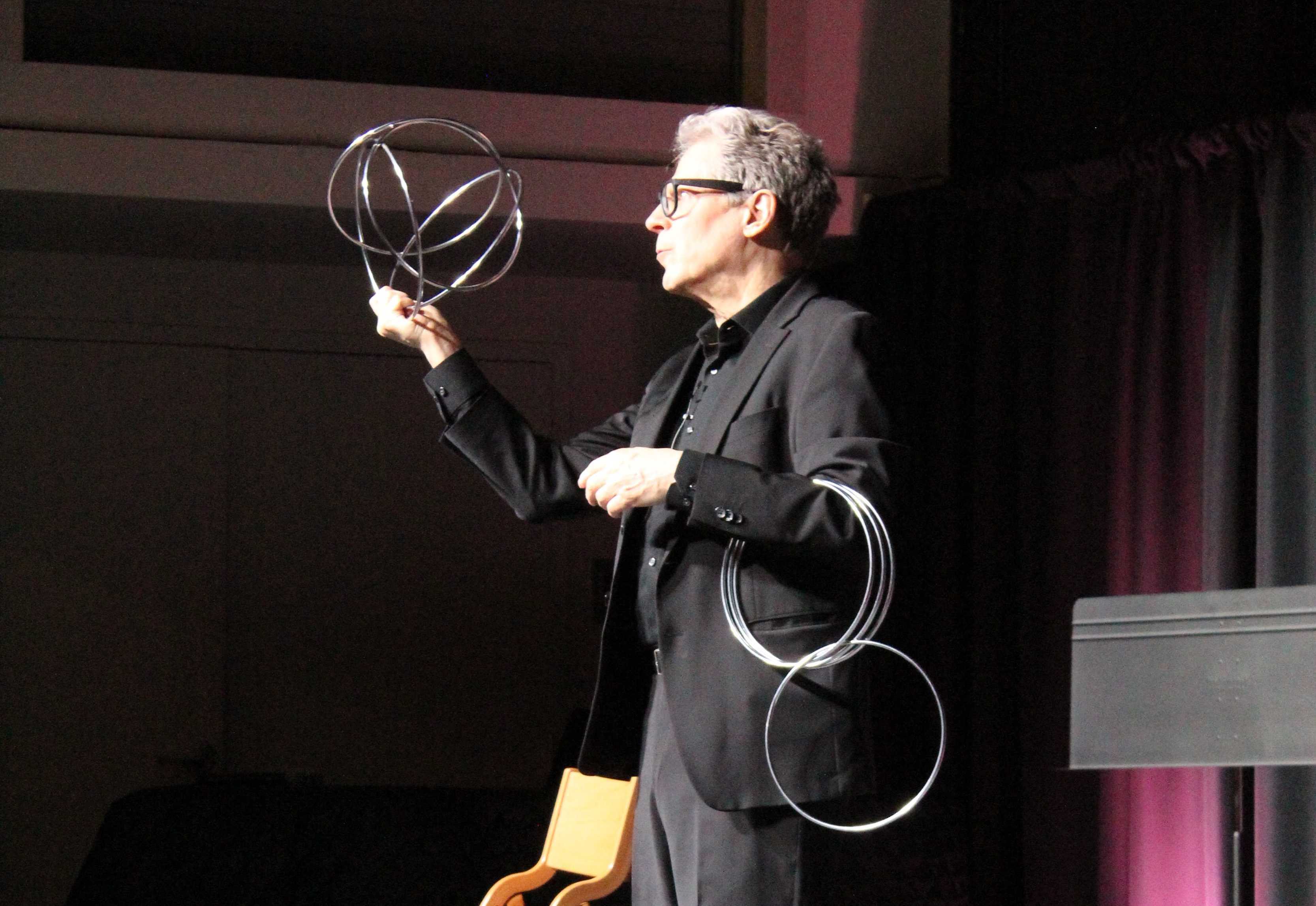 Magician pulls back curtain on history of his craft