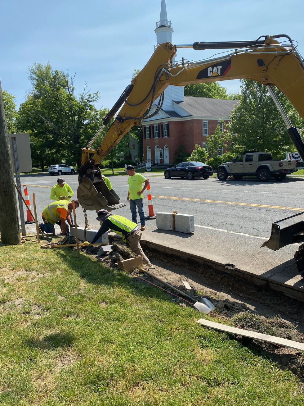 Curbing underway on Sharon Green