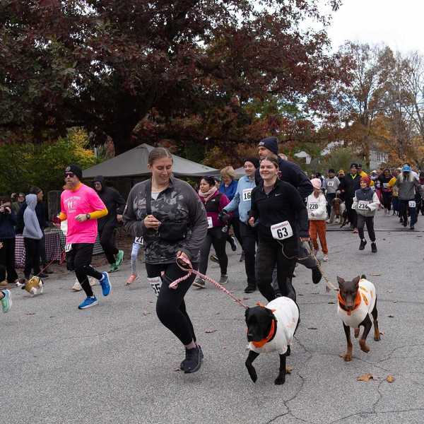 Runners and dogs race to support Little Guild