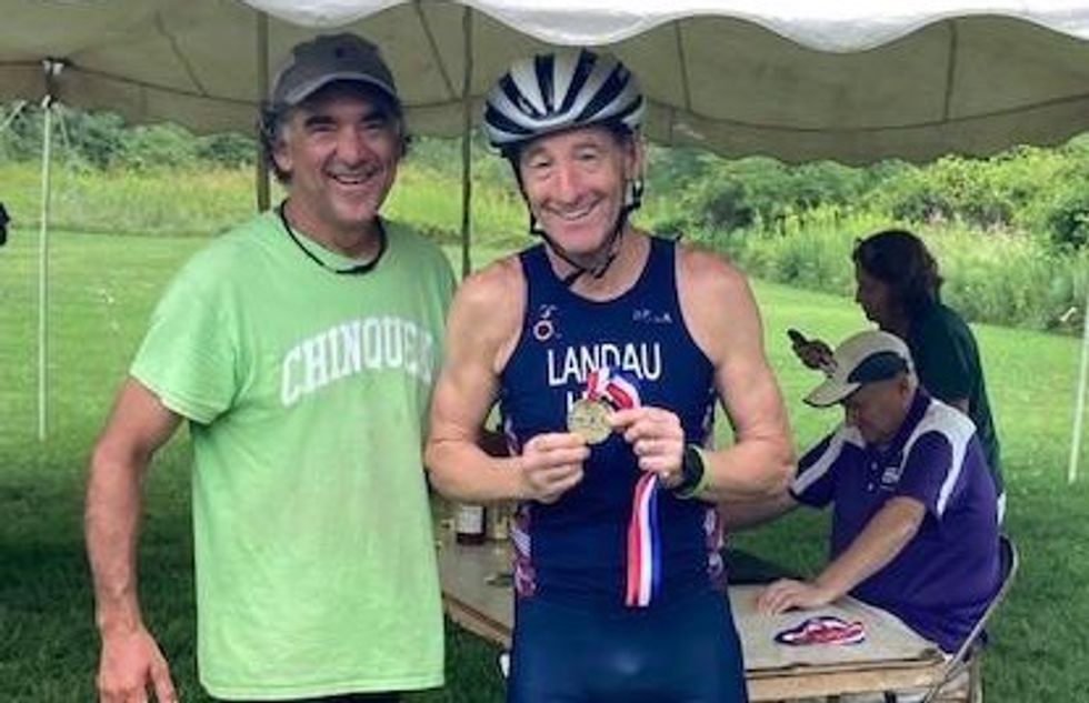 Who is that cycling, sprinting barefoot triathlete?