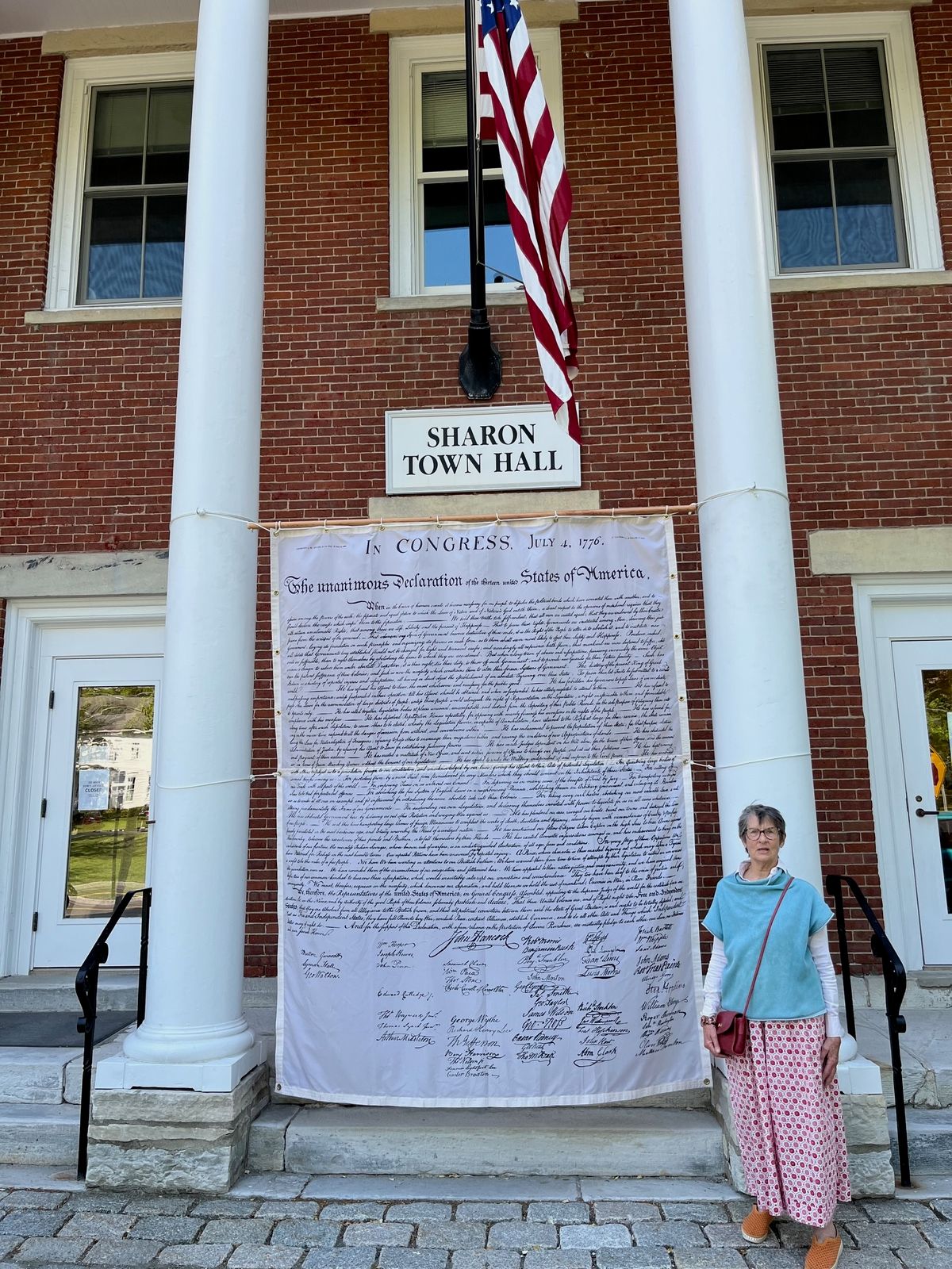 Life-sized Declaration of Independence hangs outside of Sharon Town Hall