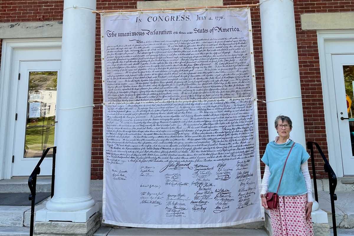 Life-sized Declaration of Independence hangs outside of Sharon Town Hall