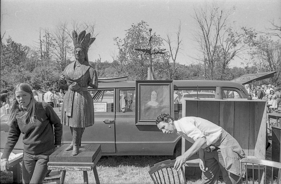 An antique photo of a venerable antiques sale
