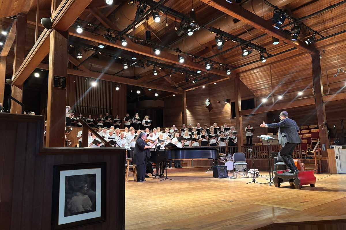 Annual choral performance probes the nation’s identity with bluegrass and a call for tolerance