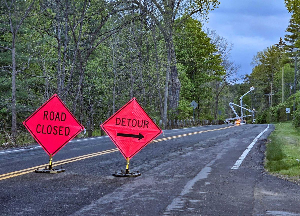Van strikes utility pole, closes Route 112 for hours