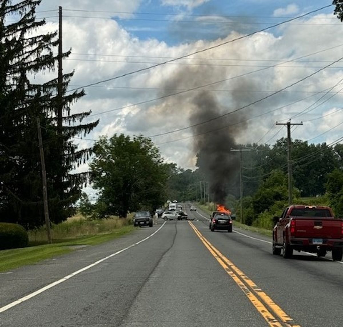 Fast-acting driver rescues
two after head-on collision